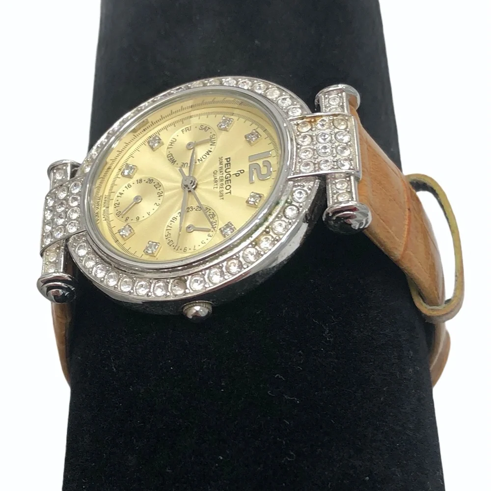 P. PEUGEOT YELLOW FACE & CROCODILE STAMPED BAND WITH CRYSTAL BEZEL WATCH
